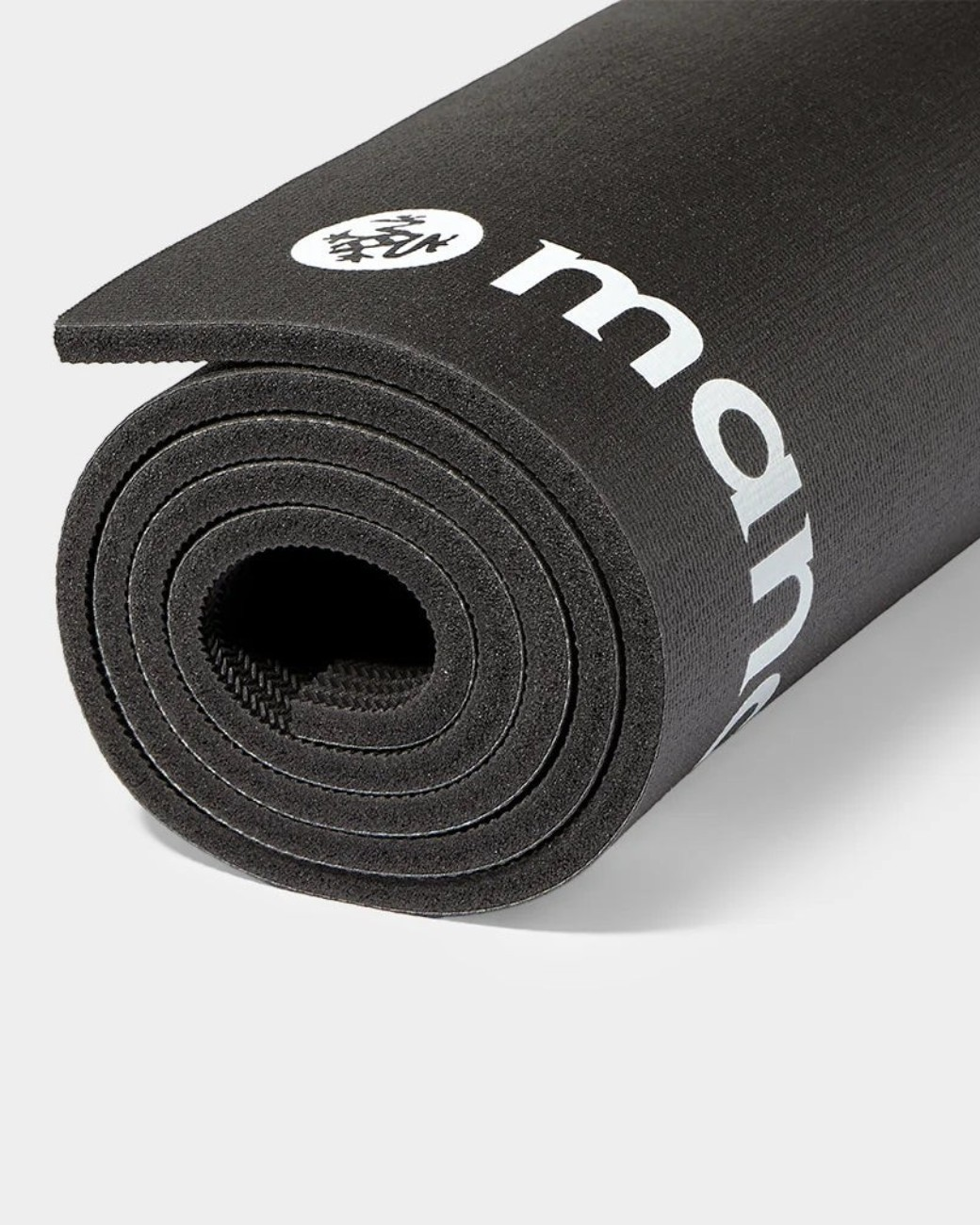 greenyogashop ENDURA Fitnessmatte in Schwarz, 10 mm dick, aufgerollt mit weißem Logo-Aufdruck
