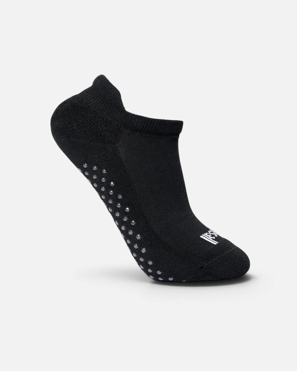 Schwarze greenyogashop Anti-Rutsch-Socke aus Baumwollmix mit Silikon-Noppen an der Sohle und Ferse