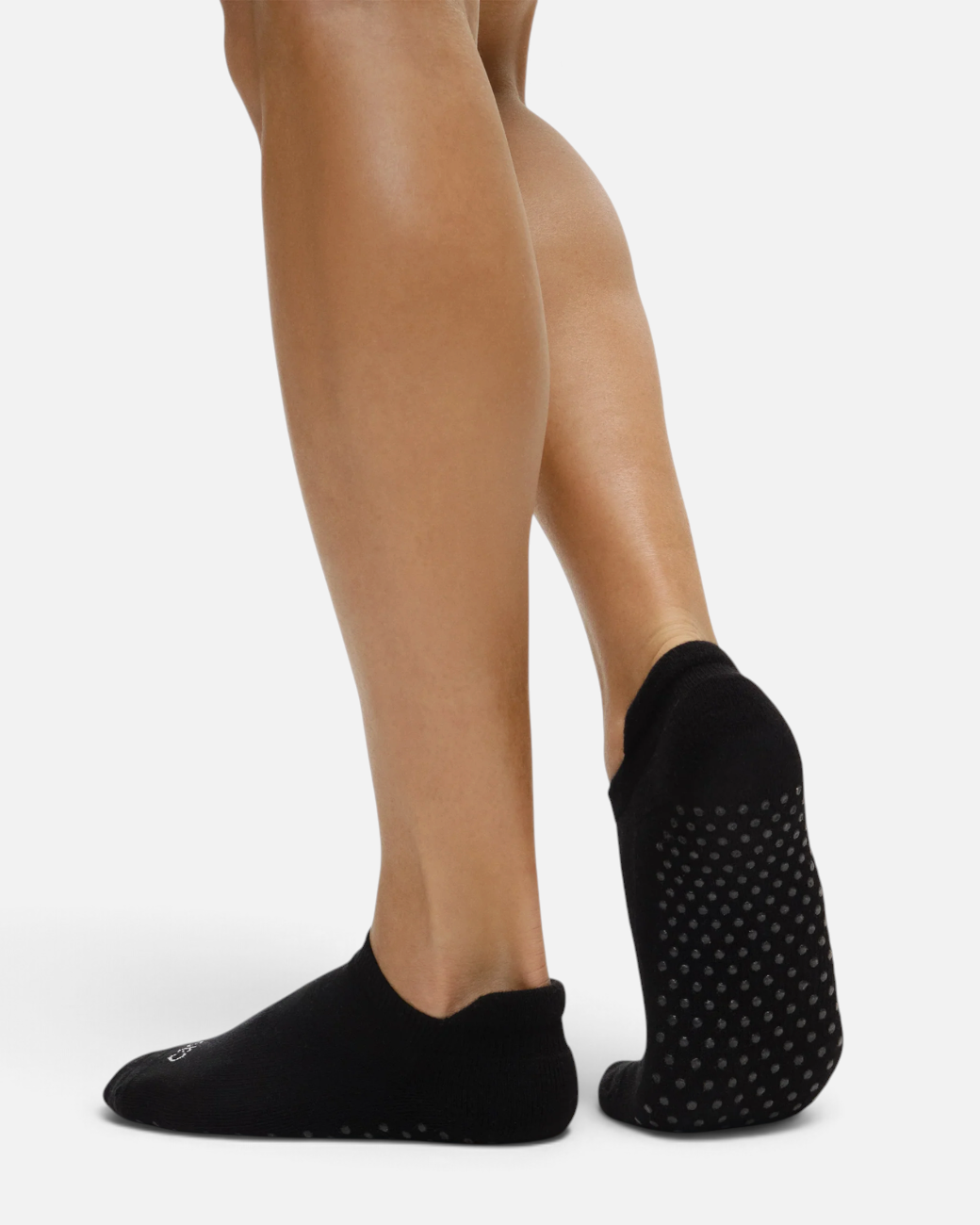 greenyogashop schwarze Anti-Rutsch-Socken mit Silikon-Noppen an der Sohle und Ferse für sicheren Halt beim Yoga